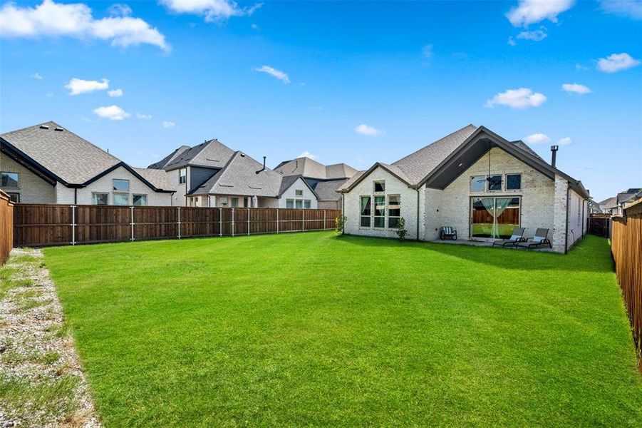 View of yard with a patio