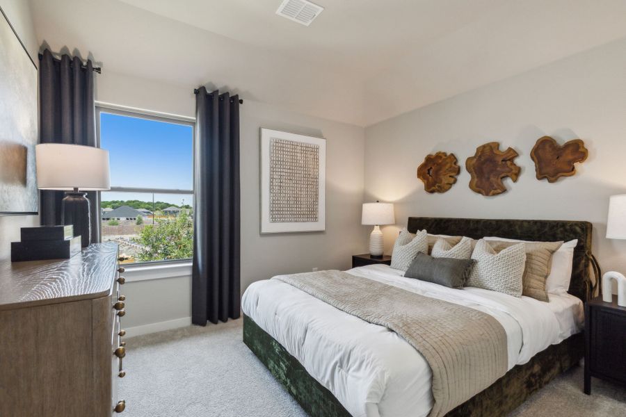 Bedroom in the Willow home plan by Trophy Signature Homes – REPRESENTATIVE PHOTO