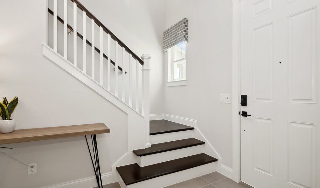 Staircase off foyer