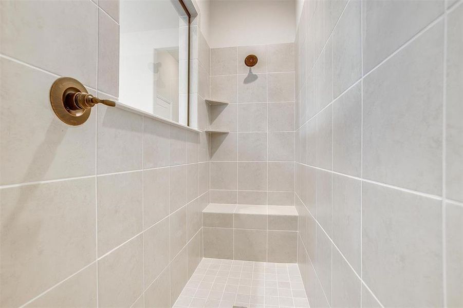 Bathroom with a tile shower