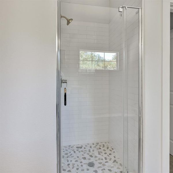 Bathroom with an enclosed shower