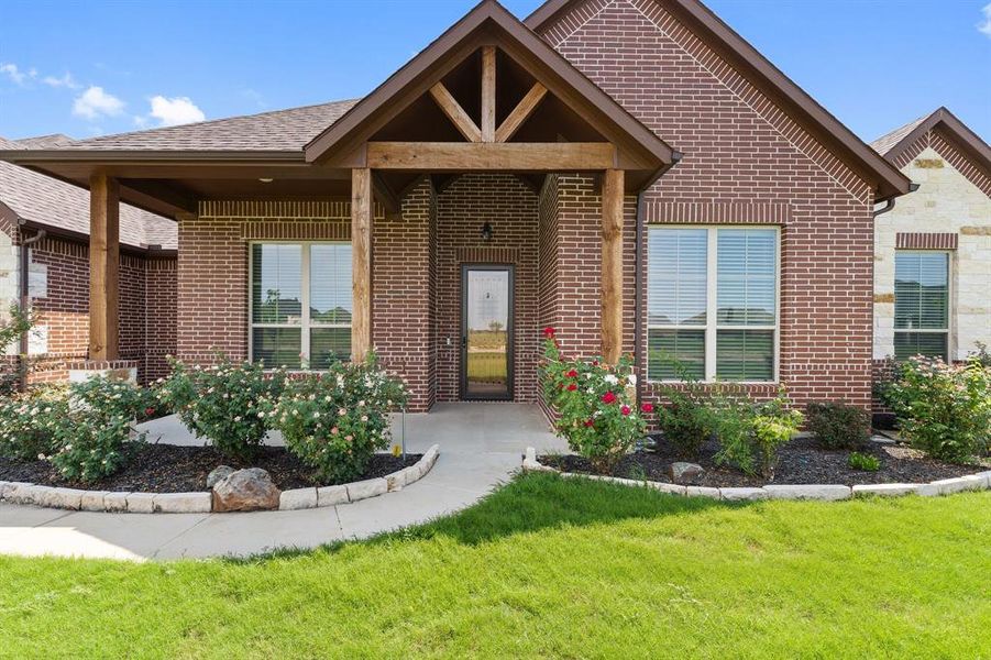 View of front of house with a front yard