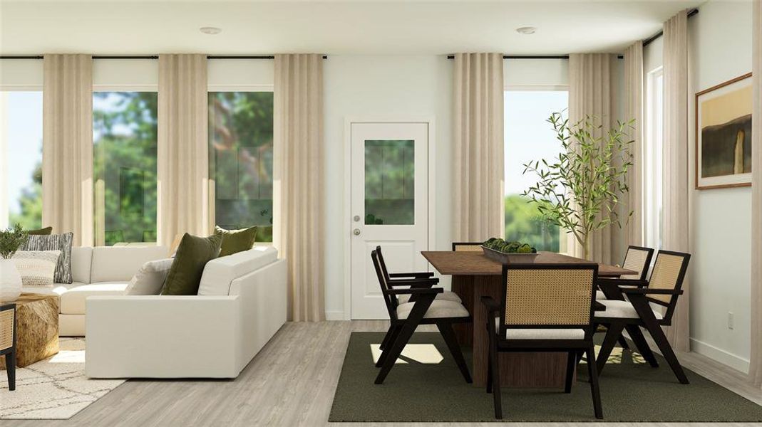 Dining area with light hardwood / wood-style floors