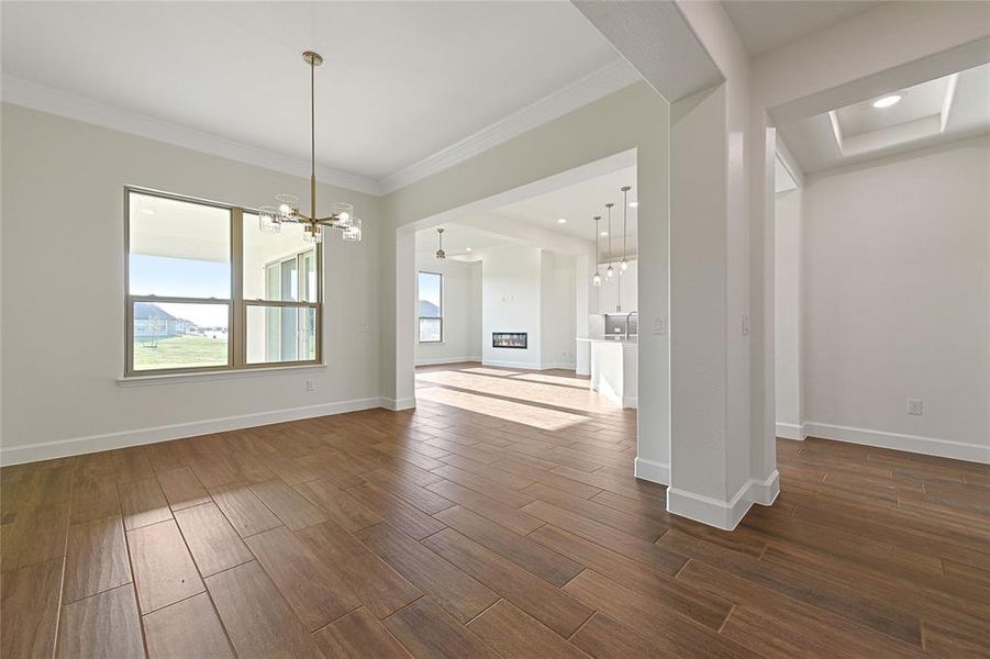 The dining room opens to the kitchen and living room.