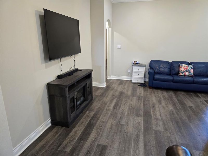 Living room featuring dark hardwood / wood-style floors