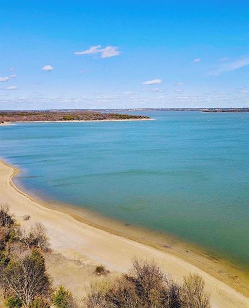 Property view of water with a beach view