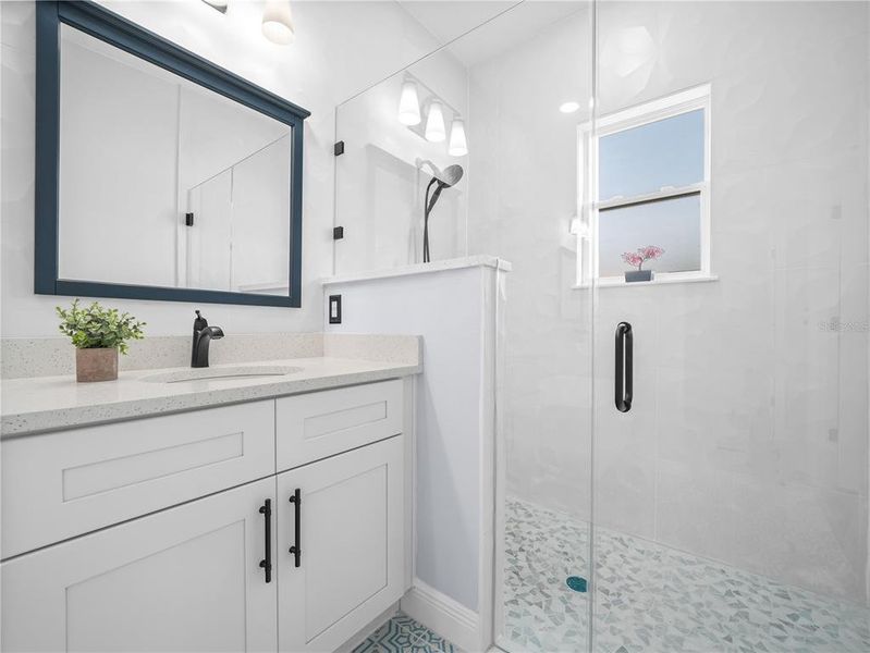 Dual sinks and large walk-in shower