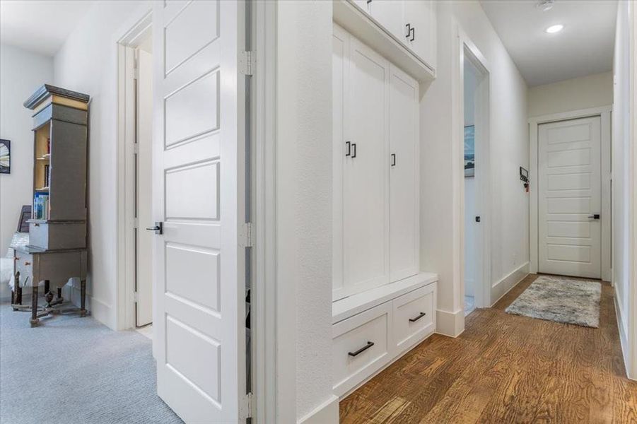 Mudroom with dark hardwood / wood-style flooring