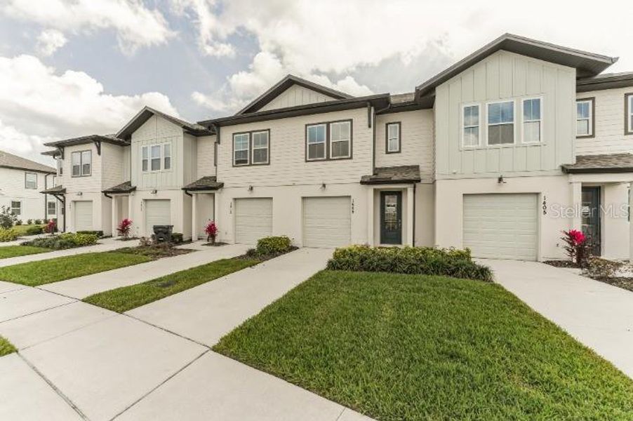 New construction Townhouse house 1409 Discovery Street, Davenport, FL 33896 Laurel Homeplan- photo