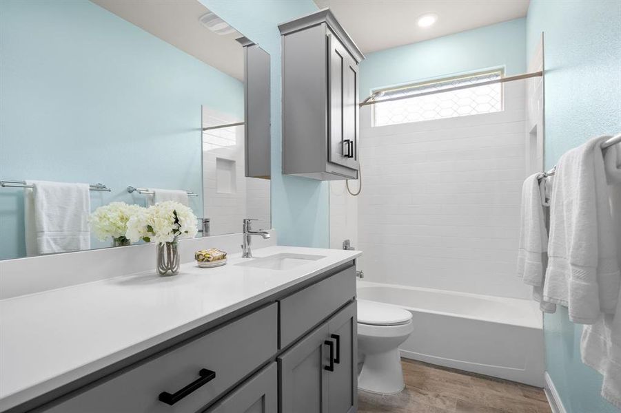 Secondary guest bathroom with a shower-tub combo!