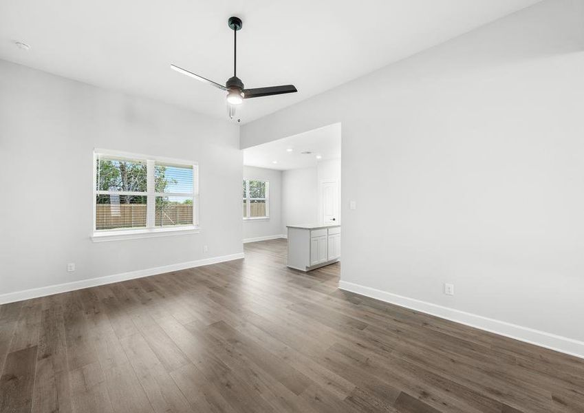 The large windows in the family room of the Blanco let in great natural light and backyard views.