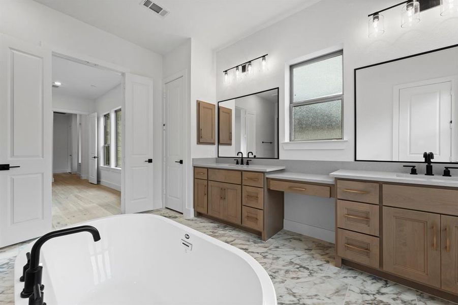 Primary Bath with Double Sinks and Vanity Area