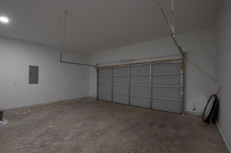 Garage featuring electric panel