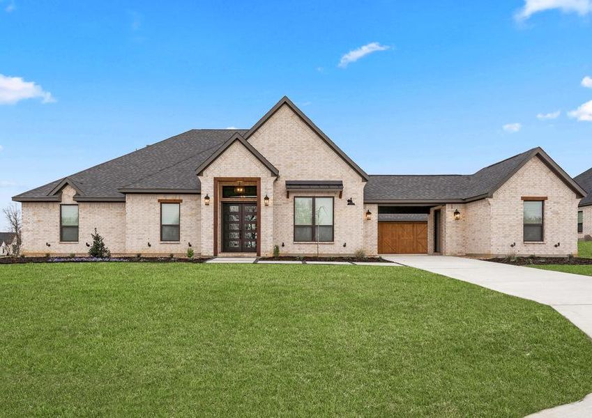 The Garza is a beautiful, one-story brick home with wood accents.