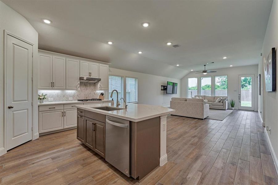 Open and desirable floor plan with kitchen dining and family room all connected