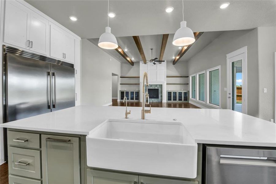 Kitchen featuring wine cooler, white cabinets, and dark hardwood / wood-style flooring