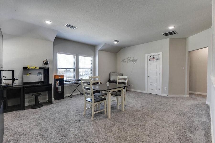 Large open area upstairs could be used as a game room.
