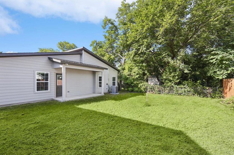 View of yard with central AC