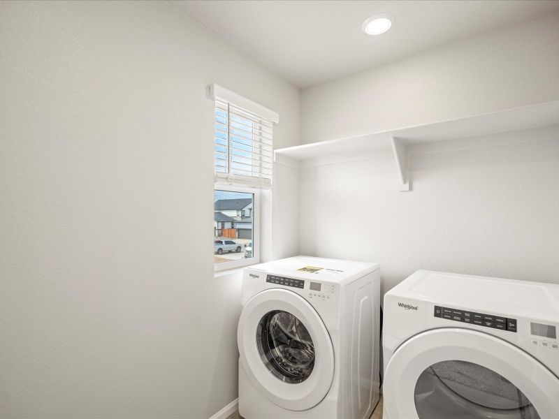 The Vail floorplan interior image taken at a Meritage Homes community in Northern Colorado.