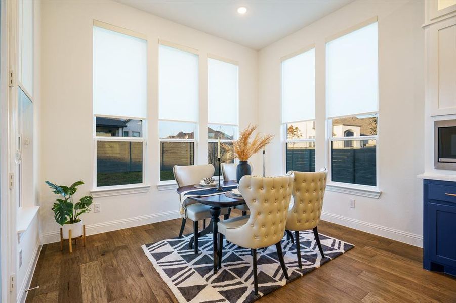 Dining area featuring dark hardwood / wood-style floors