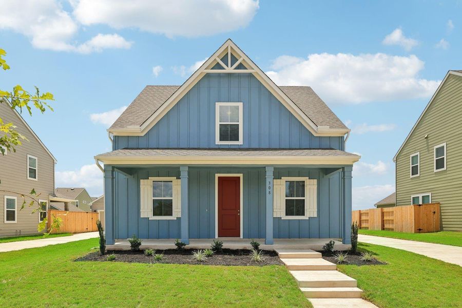 Charming front exterior w/ large front porch