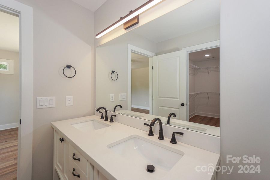 (Representative photo) The owner's bathroom will have a nice vanity with modern fixtures.