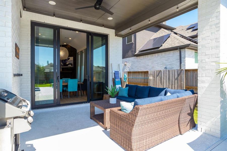 On a hot Texas day, the covered patio with an outdoor fan will keep you cool.