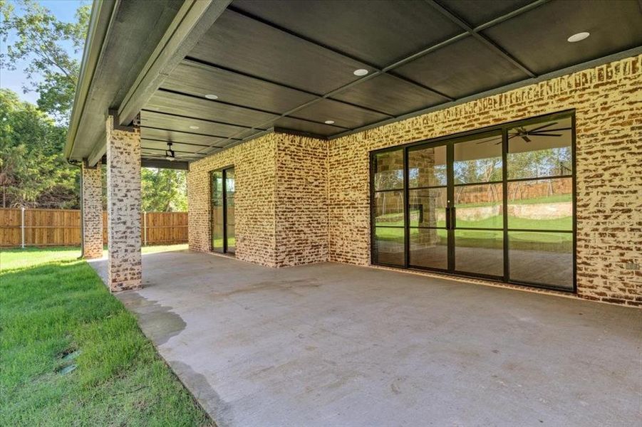 View of patio with ceiling fan