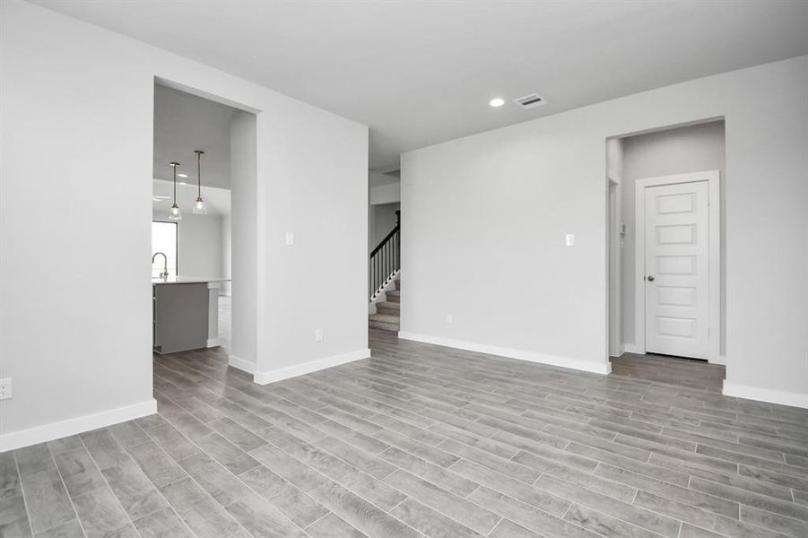 Another view of dinning area. Sample photo of completed home with similar floor plan. Actual colors and selections may vary.