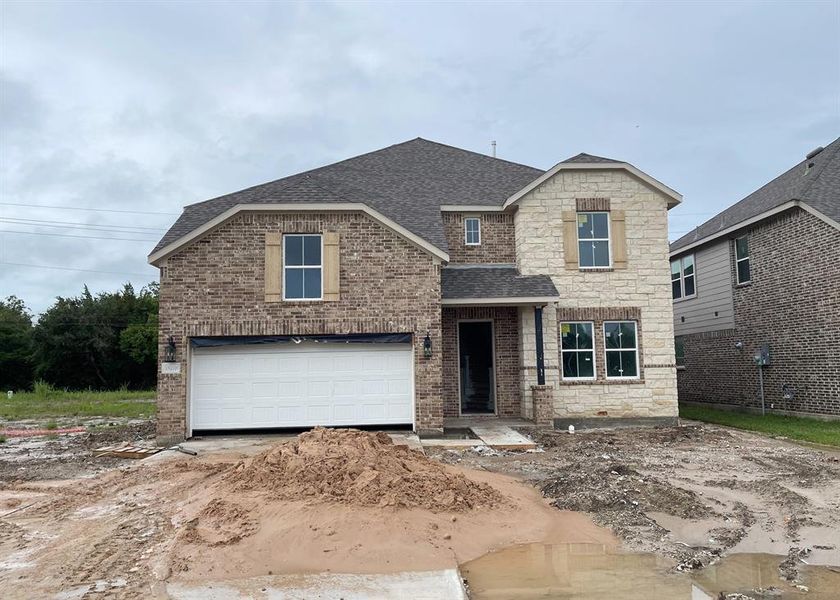 Two-story home with 4 bedrooms, 3.5 baths and 2 car garage