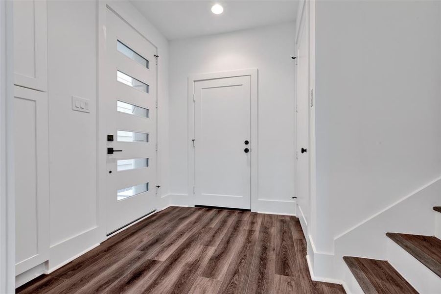 Welcome home. The entryway/foyer of the property offers storage space and access to your two-car garage.