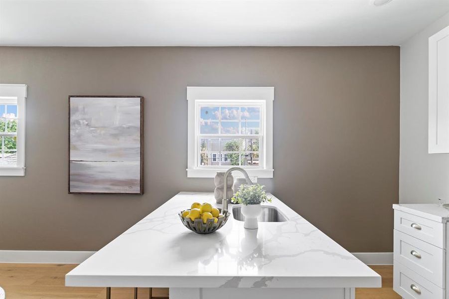 Oversized quartz kitchen island.