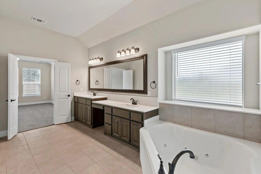 Primary Bathroom | Concept 2404 at Redden Farms - Signature Series in Midlothian, TX by Landsea Homes