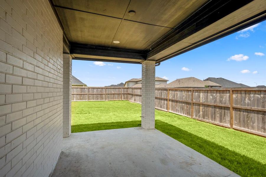 The covered patio is perfect for your outdoor living space, patio furniture, or BBQ pit! It connects to the main living area and kitchen making it great for indoor/outdoor living and entertaining.