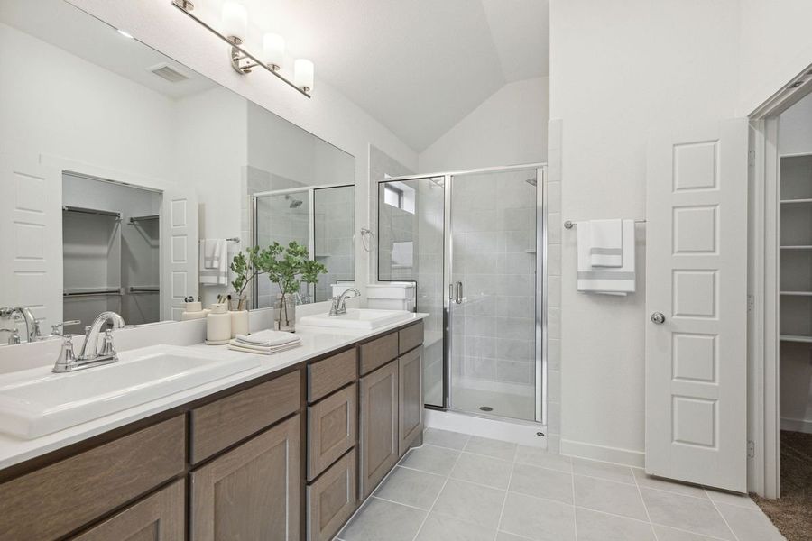 Primary Bathroom in the Jade home plan by Trophy Signature Homes – REPRESENTATIVE PHOTO