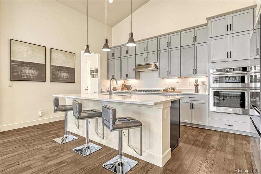 Spacious eat-in island and easy access to anywhere. Plus, all stainless steel appliances are included...talk about move-in ready!