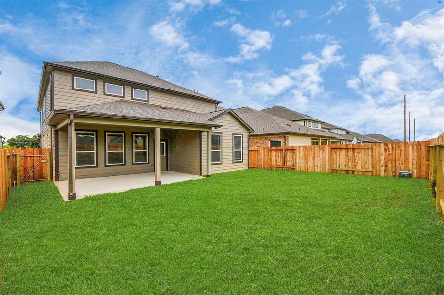 Backyard retreat, offering an abundance of space for kids to play and explore. The possibilities are endless in this outdoor haven, where the joy of open-air activities and family gatherings awaits.