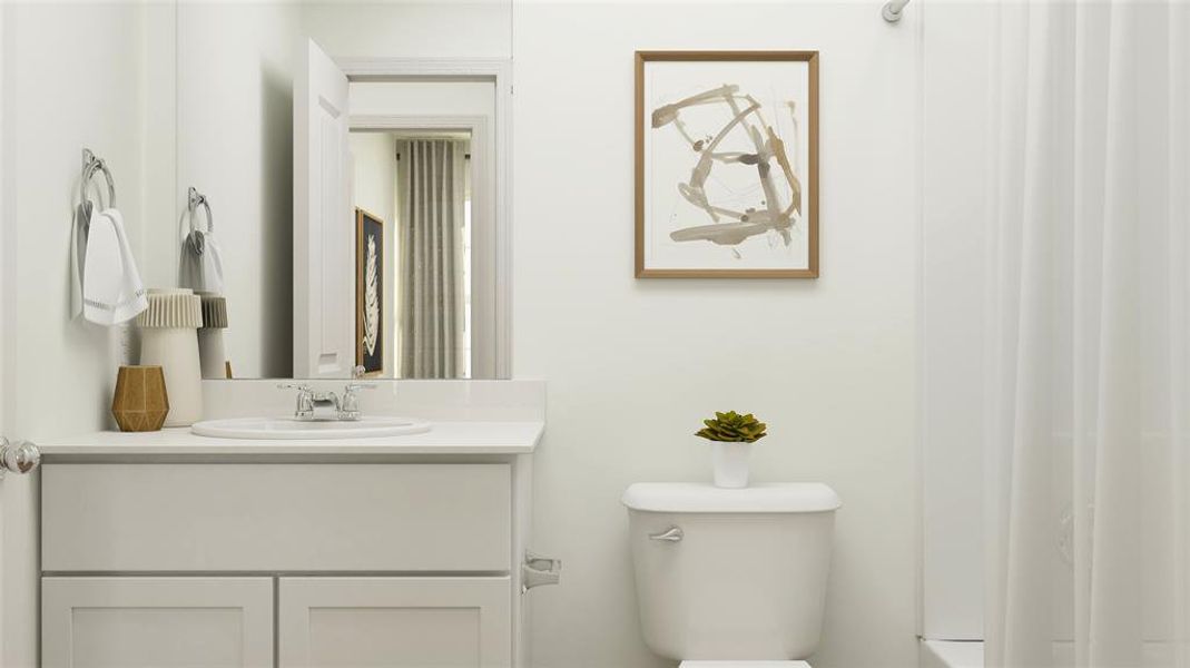 Bathroom with vanity and toilet