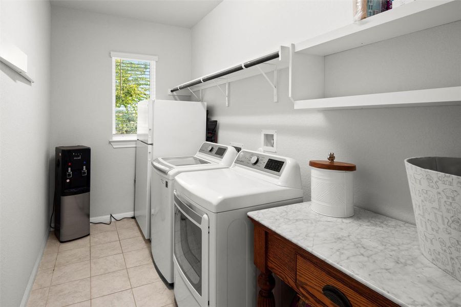 Large laundry room just with plenty of storage space