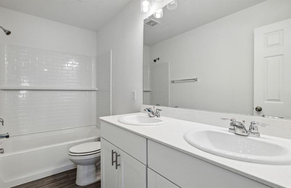 Upgraded secondary bath with premium finishes*Real home pictured