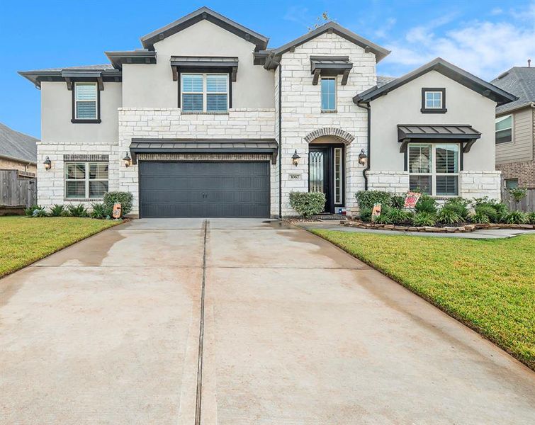 Spacious 2 car garage with extra storage space