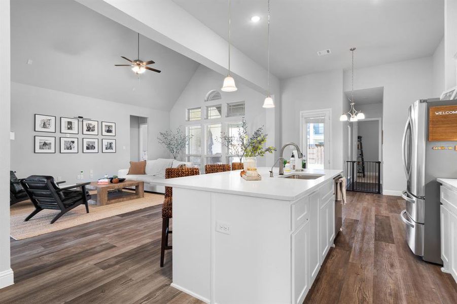 Kitchen island with quartz countertops and electrical outlets