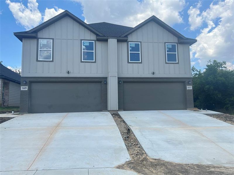 View of front of home with a garage