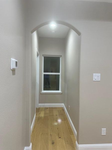 Corridor featuring light hardwood / wood-style flooring