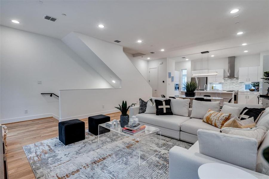 Living room featuring light hardwood / wood-style flooring