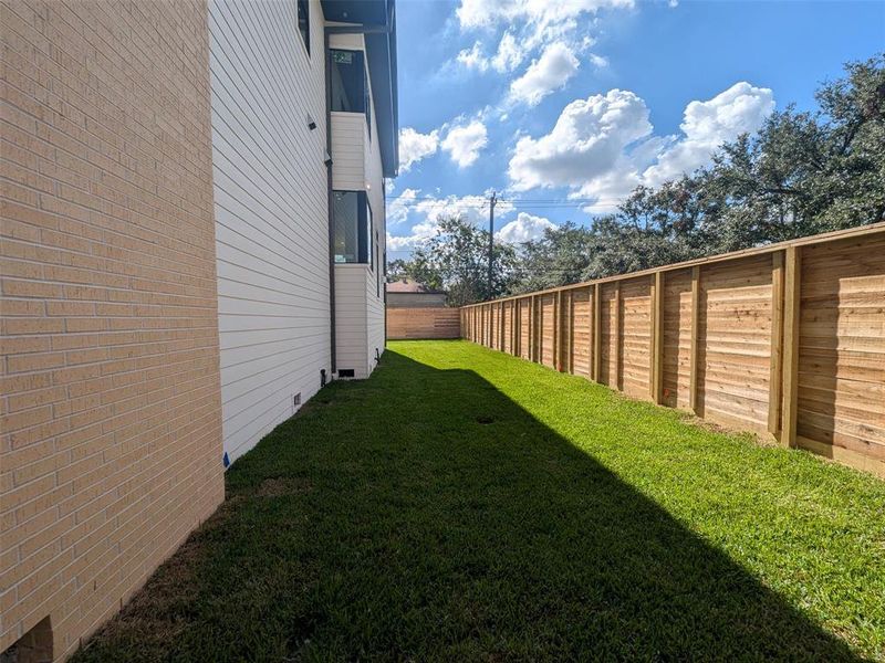 Generously sized yard for relaxing and playing with the kids and pets.