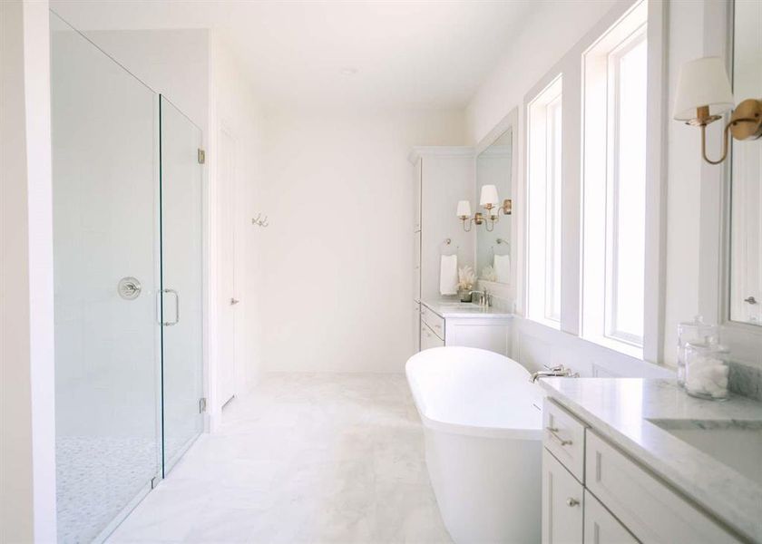 Bathroom with vanity and plus walk in shower