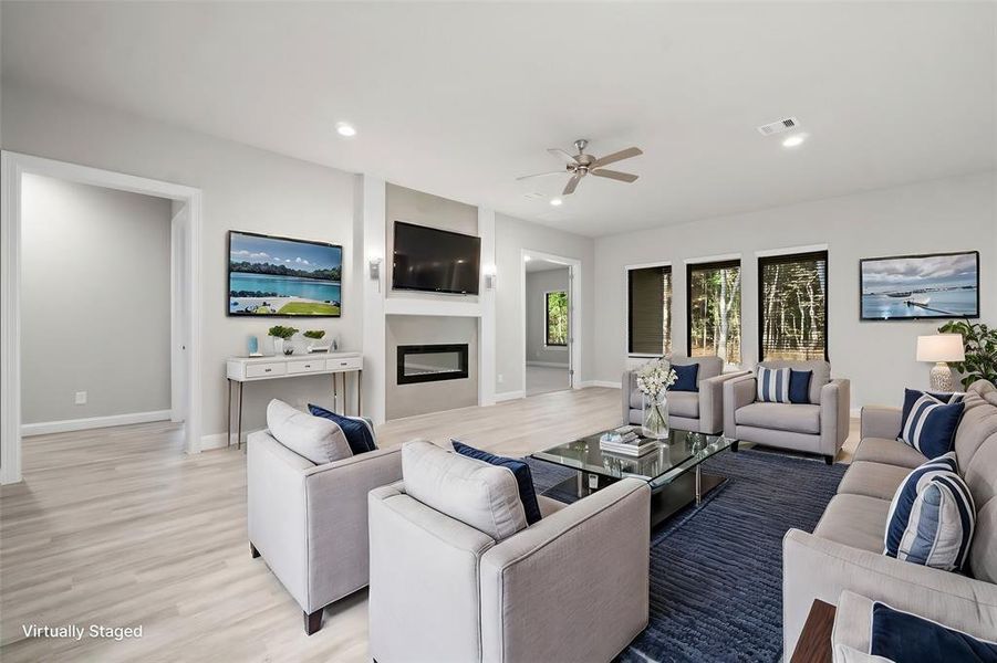 Spacious family room with fireplace.