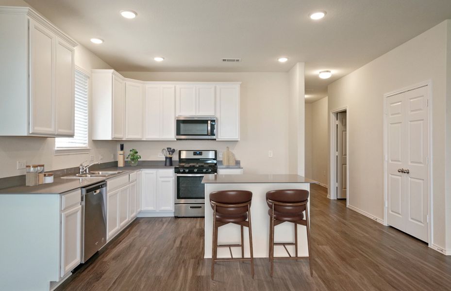 Open kitchen layout perfect for entertaining and c