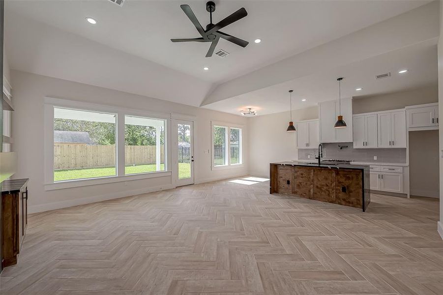 The living space features 12ft ceilings.